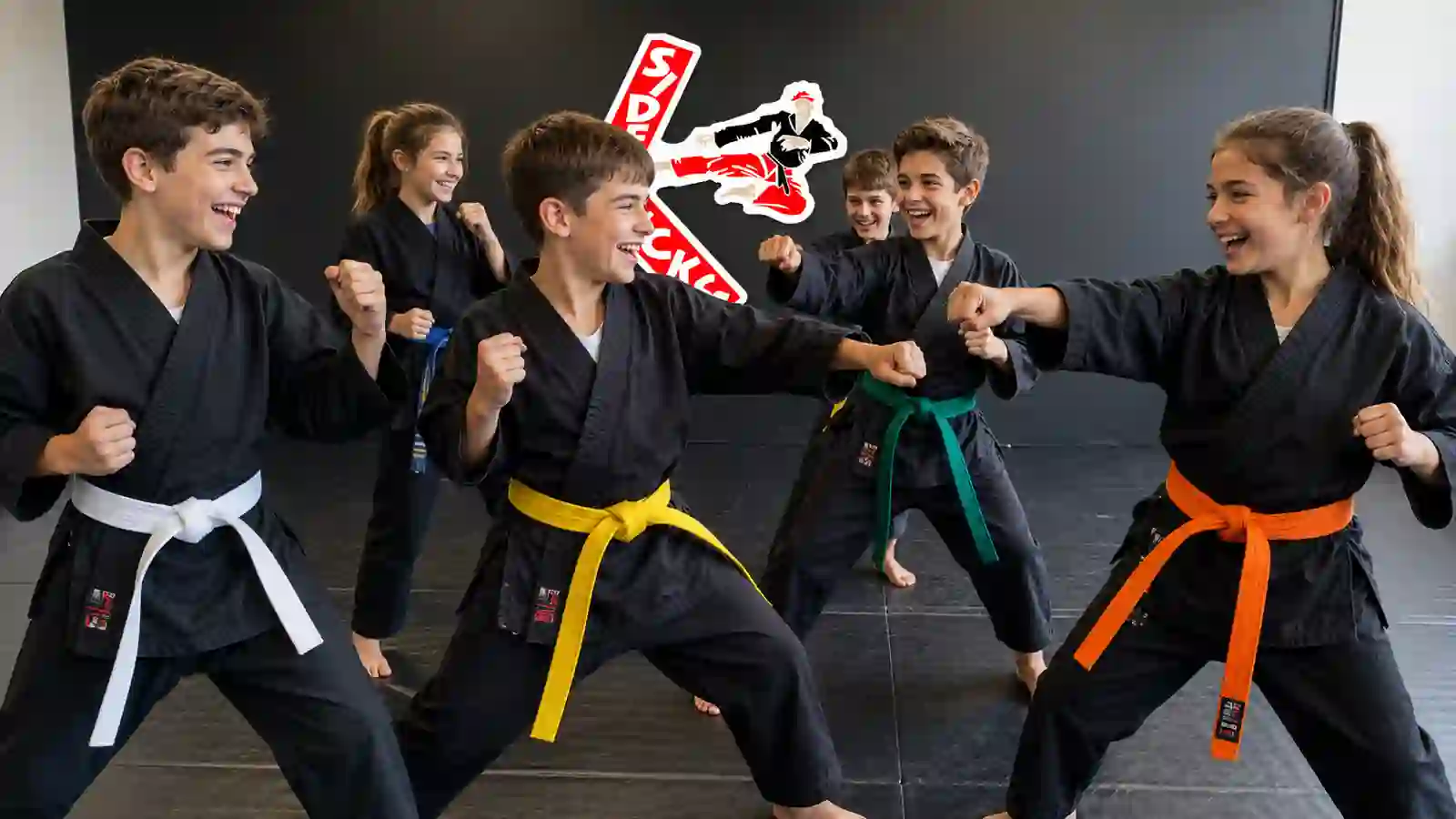 Side Kicks Karate students in fighting stance
